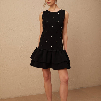 Freya Black Peplum Hem Beaded Mini Dress in Classic Black Sleeveless Scoop Neck Stretch Knitted Textured Finish