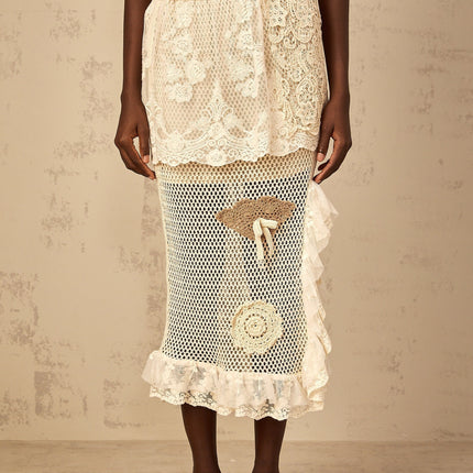 Gelsomina Lace Crochet Skirt in Neutrals floral-lace embroidered high-rise midi cut-out design bow semi-sheer elasticated waistband ruffled trim side slit crochet knit artistry sophistication