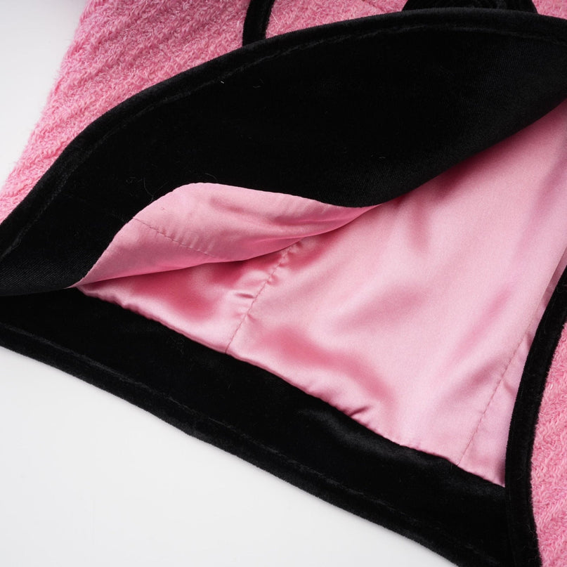Gelsomina Pink Jacket and Black Trousers Set 100 Percent Polyester Cropped Jacket with Faux-Flower Detailing and Feather-Trimmed Cuffs Crystal Embellished Black Trousers with Feather Accents and Slit Detailing