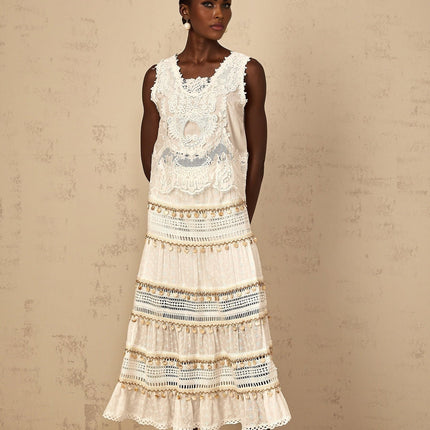 Gemmina White Cropped Top Floral Embroidered Frayed Edge 100 Percent Cotton Sleeveless Cut Out Detailing Chic Silhouette Contemporary Allure Day Evening Wear Versatile On Trend Sophisticated Charm High Waisted Trousers Flowing Skirt Modern Twist Stand Out Style