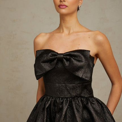 Giacomina Black Mini Dress with Off-Shoulder Design and Bow Detailing