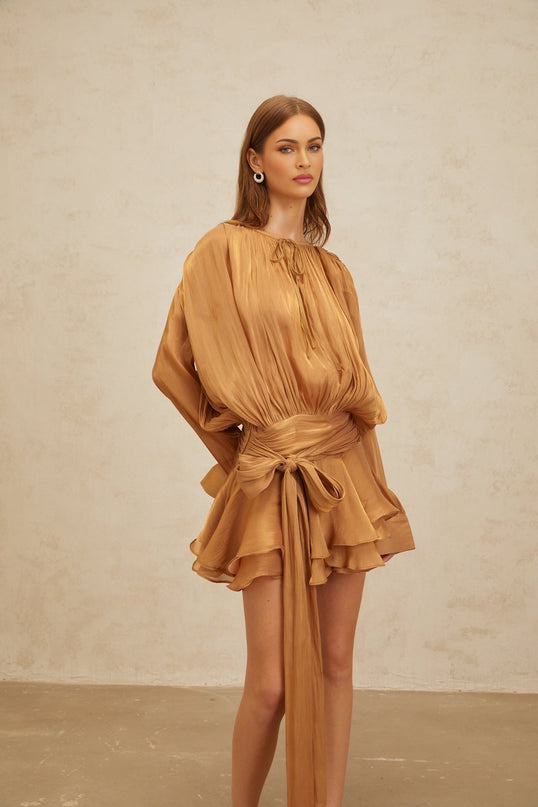 Gilda Gold Pleated Ruffled Mini Dress Twist Hem Shoulder Pads Long Buttoned-Cuff Sleeves Neck Tie Fastening Glitter Detailing Semi-Sheer Chic Luxury Sophistication Elegant Timeless Piece Terylene Viscose Spandex