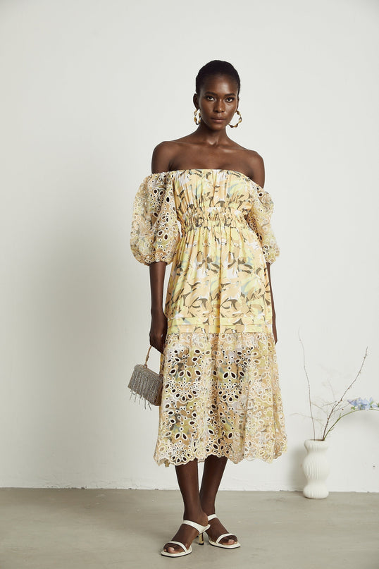Ginetta Yellow Floral Midi Dress off-shoulder cut-out detail luxurious blend Terylene Viscose floral print layered design flounce hem A-line skirt puff sleeves midi length silhouette special occasion night out refined glamour modern woman wardrobe