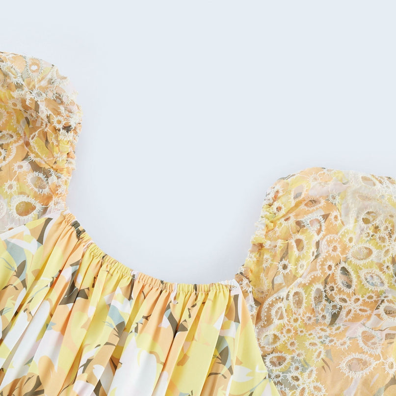 Ginetta Yellow Floral Midi Dress off-shoulder cut-out detail luxurious blend Terylene Viscose floral print layered design flounce hem A-line skirt puff sleeves midi length silhouette special occasion night out refined glamour modern woman wardrobe