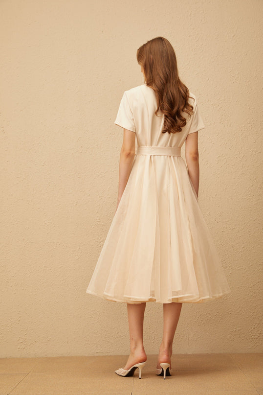 Giovanna Neutrals Midi Dress V-neck peak lapels short sleeves tied waist A-line skirt pleated tulle paneling midi length wrap design 100% Terylene fiber
