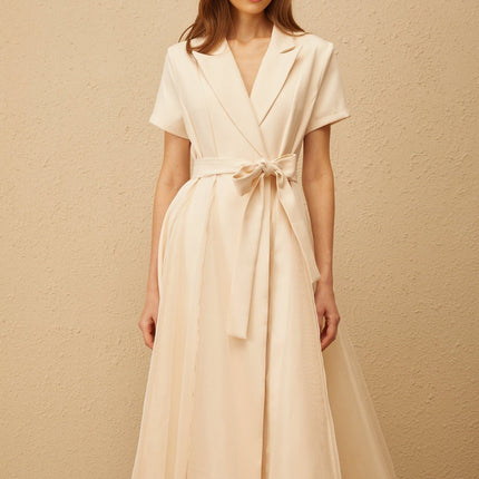 Giovanna Neutrals Midi Dress V-neck peak lapels short sleeves tied waist A-line skirt pleated detailing tulle paneling midi length wrap design 100% Terylene fiber