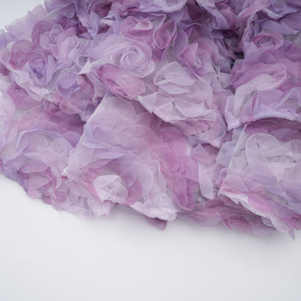 Giselle Mini Dress in Purple with 3D-petal detailing and tiered skirt made from luxurious Terylene fiber