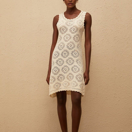 Giuditta Mini Dress in Cream White crochet knit crystal embellishments cut-out detailing fitted waistline scallop trim slip-on style special occasion modern femininity thigh-length luxurious timeless wardrobe lightweight Terylene fiber refined alluring