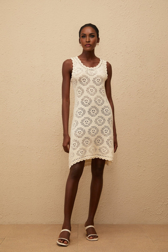 Giuditta Mini Dress in Cream White crochet knit crystal embellishments cut-out detailing fitted waistline scallop trim slip-on style special occasion modern femininity thigh-length luxurious timeless wardrobe lightweight Terylene fiber refined alluring