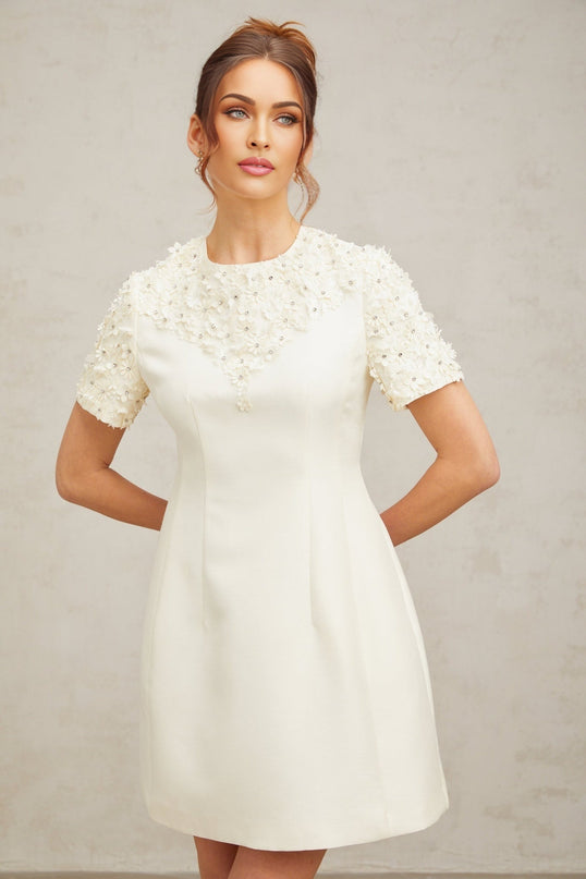 Giulia Neutrals Floral Appliqué Crystal Embellished Mini Dress A-Line Silhouette Short Sleeves Round Neck Waist Cinched Rear Zip Fastening Thigh Length 100% Terylene Luxury Style