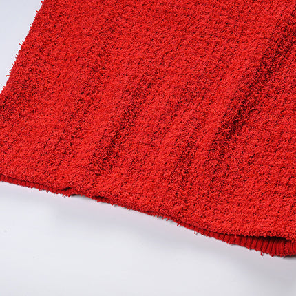 Elegant red tweed jacket with gold embellishments paired with a matching midi skirt, ideal for formal occasions
