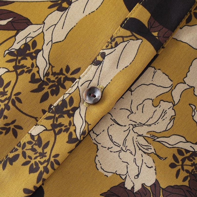 Samantha wearing Gold Bohemian Polynesian Flower Print Bodycon Dress