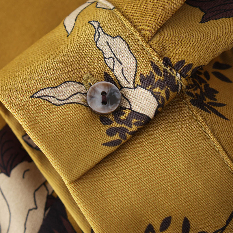 Mary wearing Gold Bohemian Polynesian Flower Print Bodycon Dress