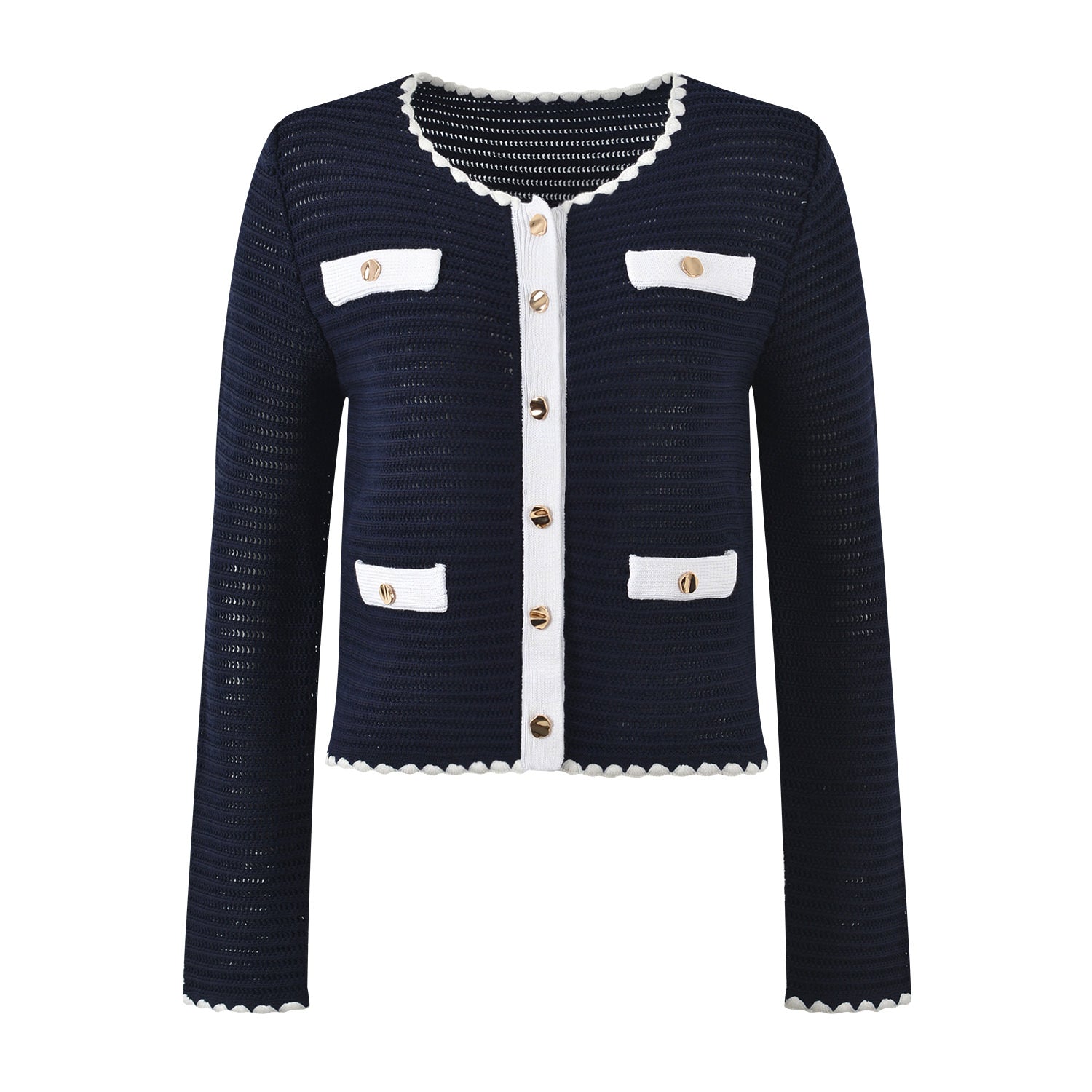 White knit cardigan with navy accents and gold buttons paired with a matching A-line skirt featuring a flared hem