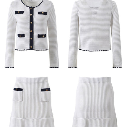 White knit cardigan with navy accents and gold buttons paired with a matching A-line skirt featuring a flared hem