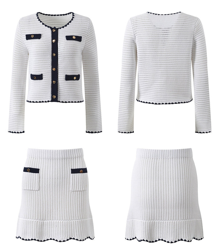 White knit cardigan with navy accents and gold buttons paired with a matching A-line skirt featuring a flared hem