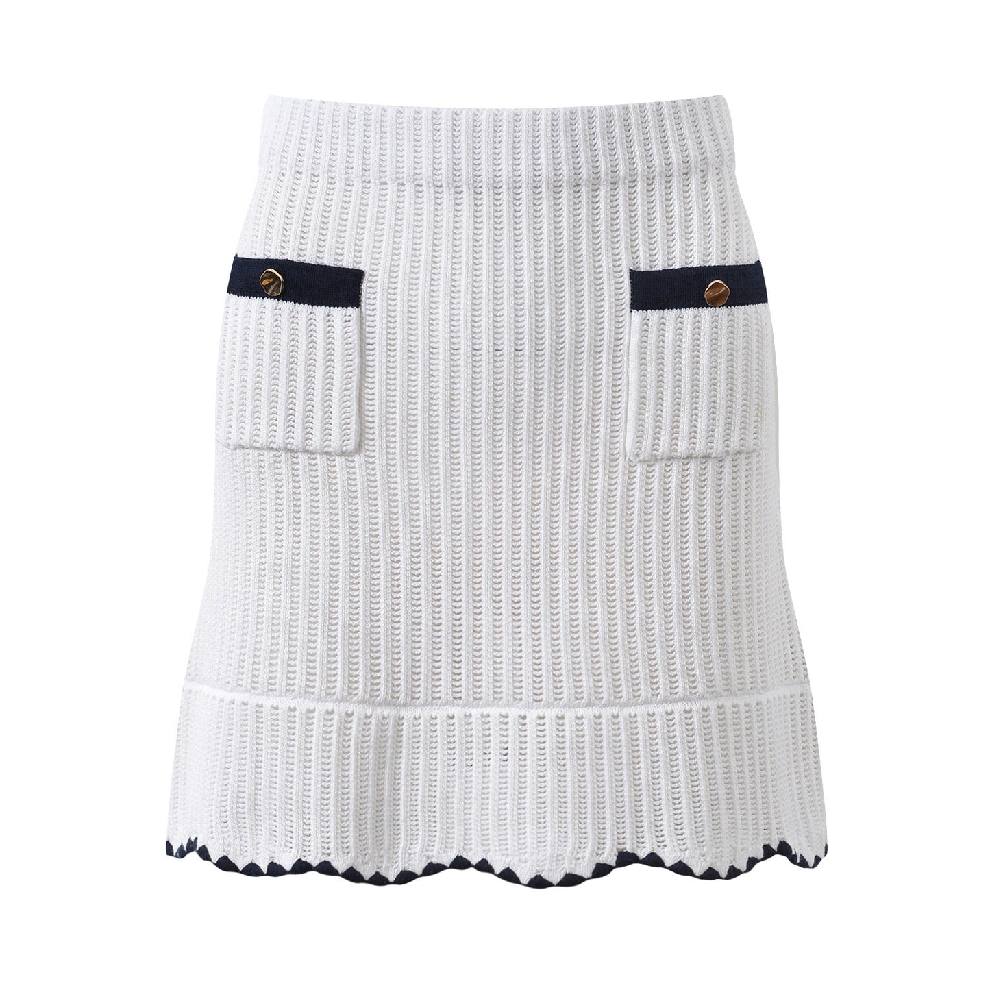 White knit cardigan with navy accents and gold buttons paired with a matching A-line skirt featuring a flared hem