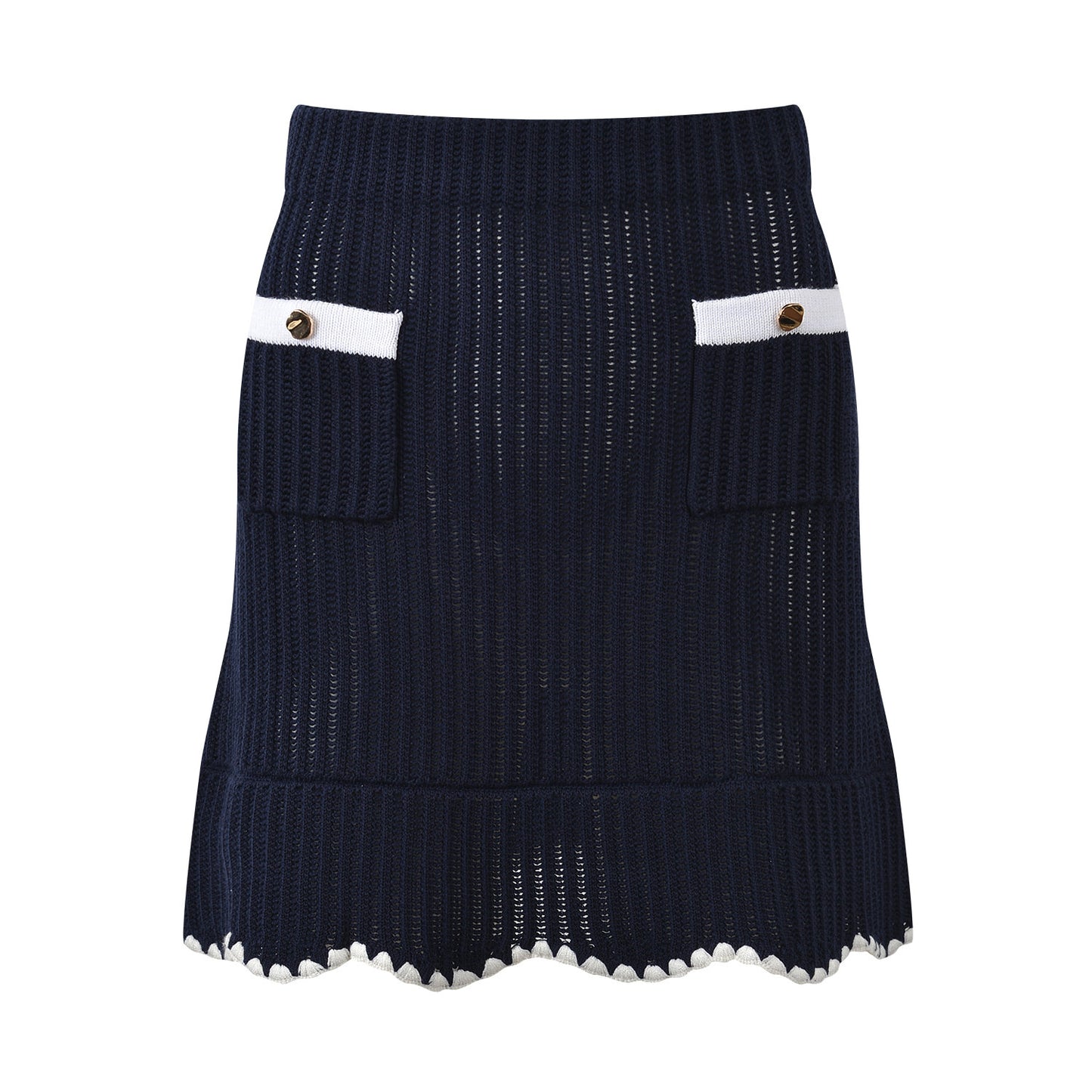 White knit cardigan with navy accents and gold buttons paired with a matching A-line skirt featuring a flared hem
