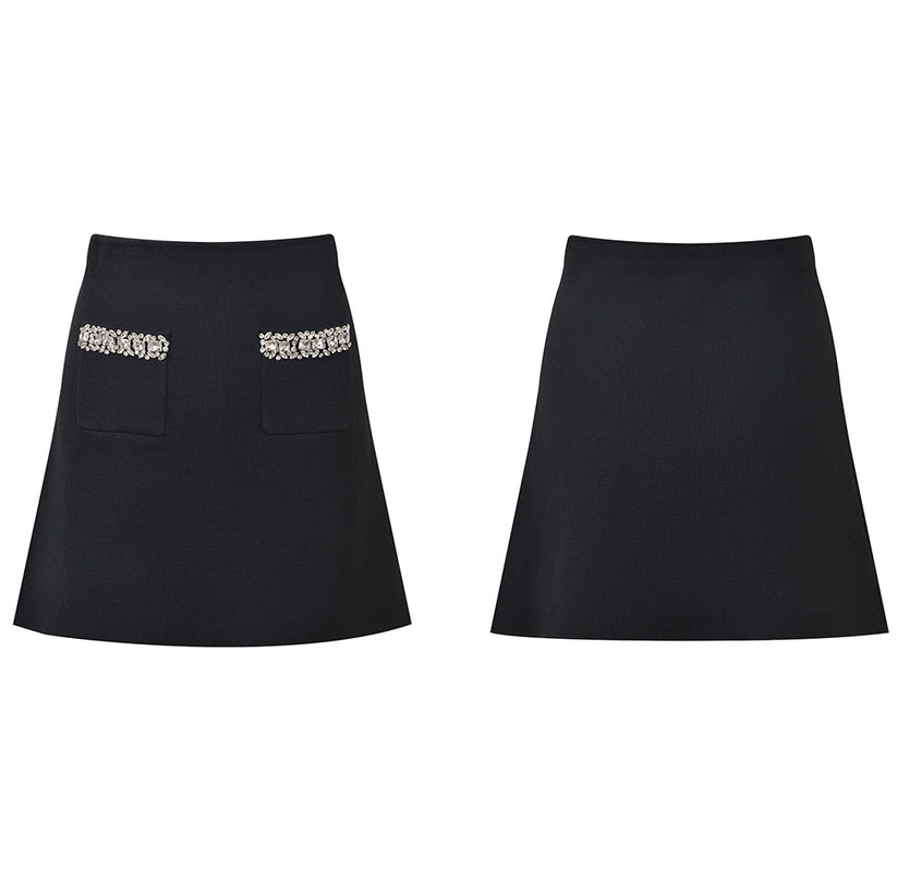 Gray knit cardigan and skirt set with crystal embellishments