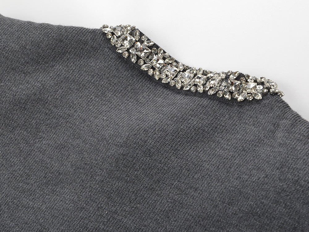 Gray knit cardigan and skirt set with crystal embellishments