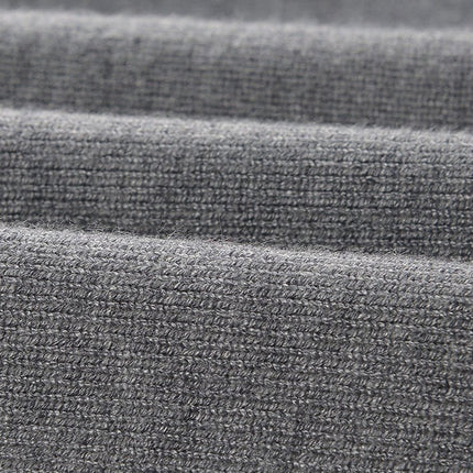 Gray Knit Dress with White Ruffle Details and Black Bow Accent