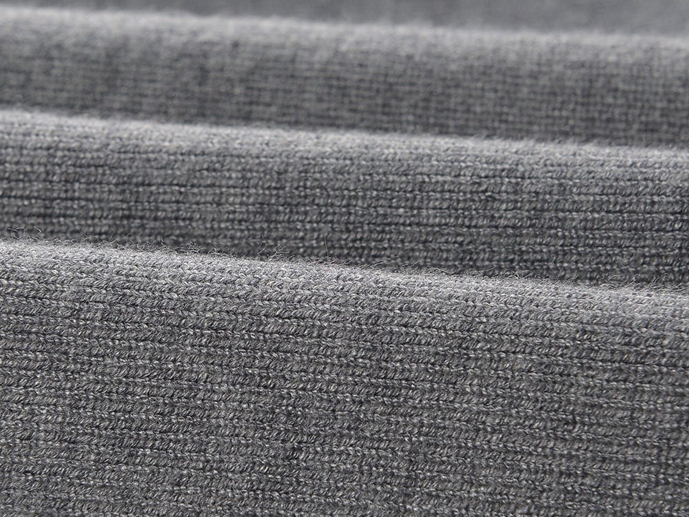 Gray Knit Dress with White Ruffle Details and Black Bow Accent