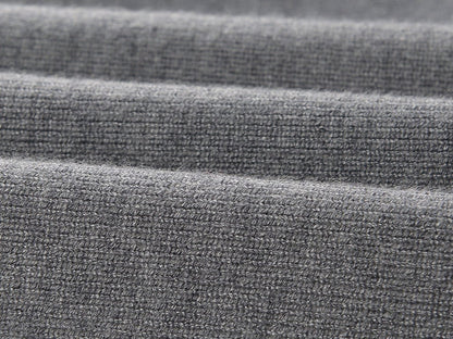 Gray Knit Dress with White Ruffle Details and Black Bow Accent
