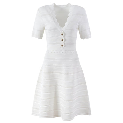 Green A-line silhouette dress with decorative button front closure and scalloped neckline