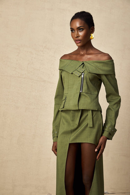 Green asymmetric jacket and skirt set named Elena featuring matching design elements