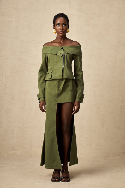 Green asymmetric jacket and skirt set named Elena featuring matching design