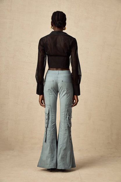 Green flared cargo trousers with belt loops and multiple pockets on the legs