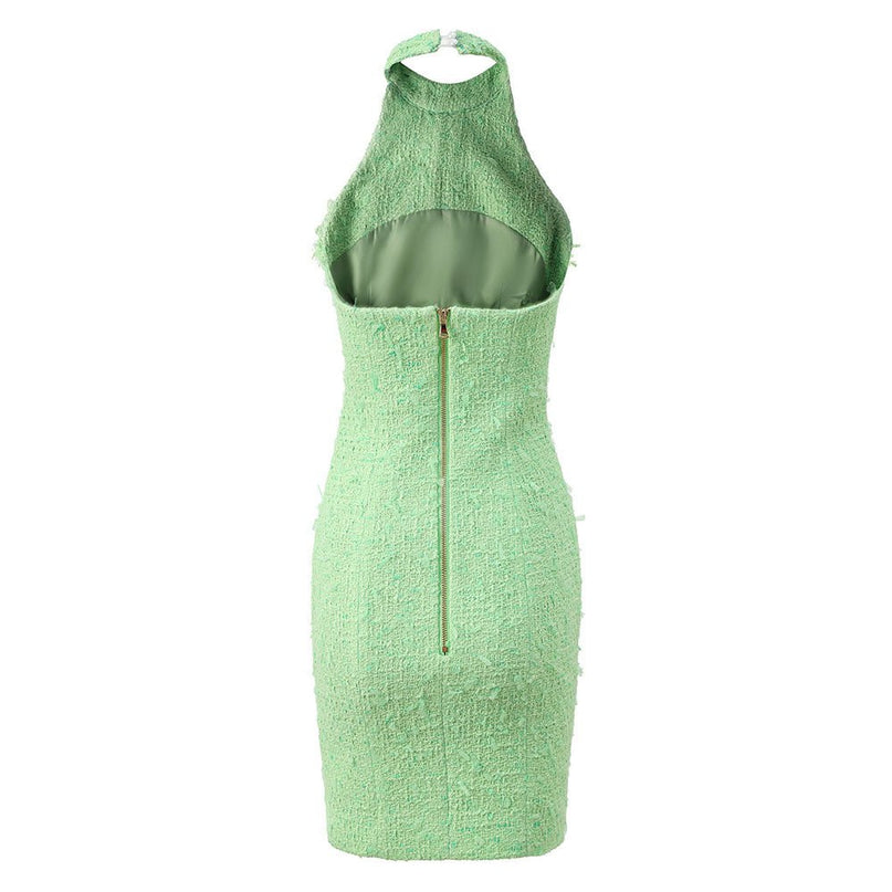 Green halter neck dress with rhinestone accents and button closure