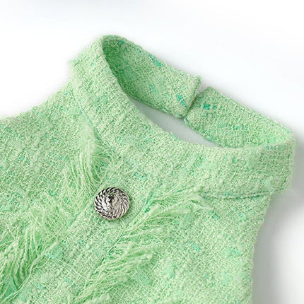 Green halter neck dress with rhinestone embellishments