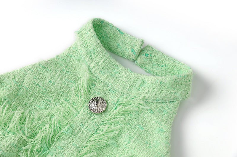 Green halter neck dress with rhinestone embellishments