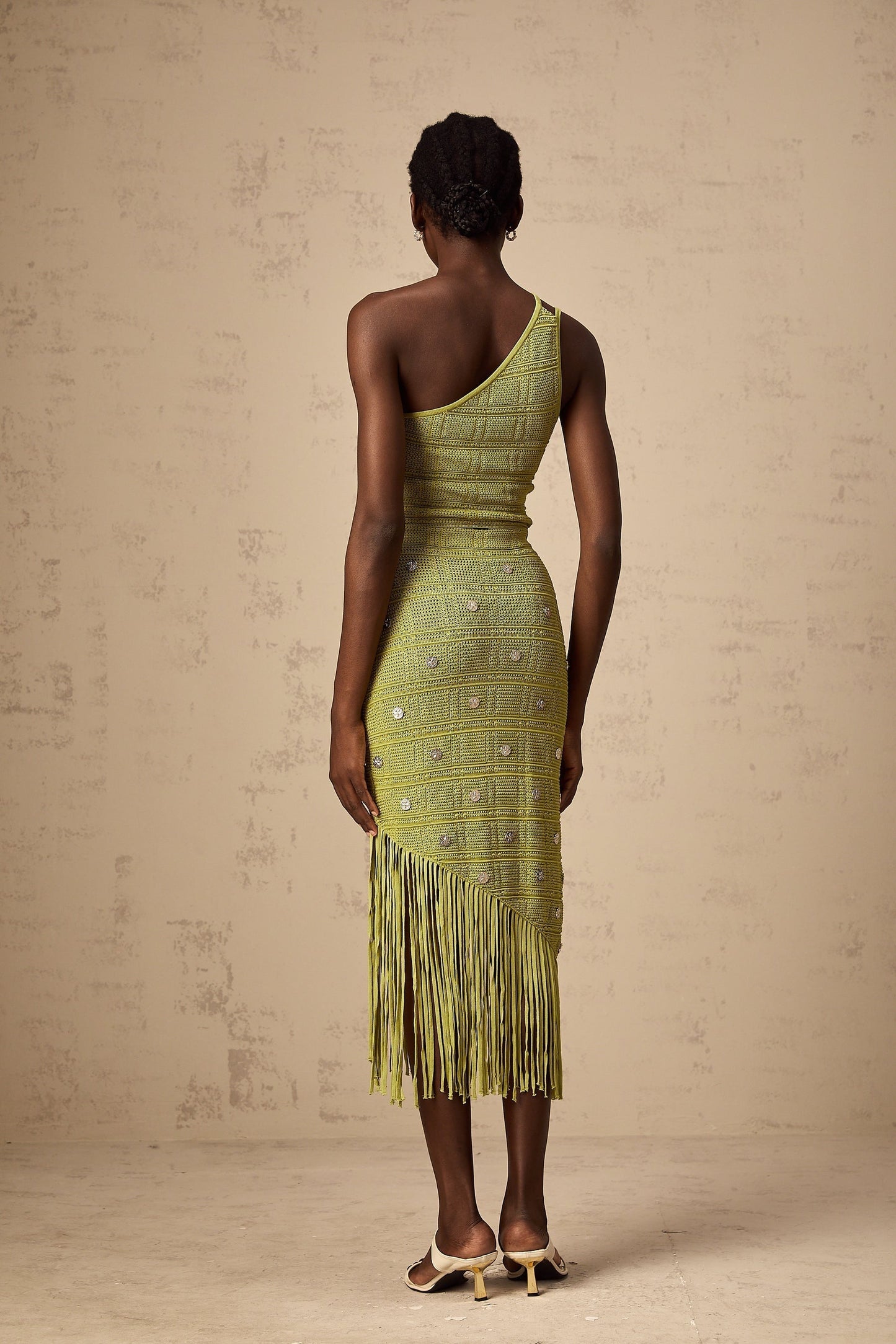 Green knit top and skirt set with embellishments named Annette featuring matching design