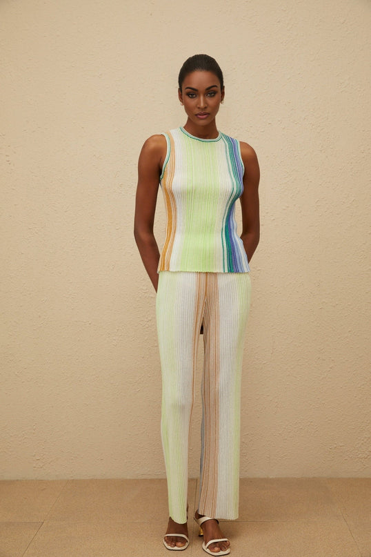 Green knitted sleeveless top and wide leg trousers with metallic threading and glitter detailing
