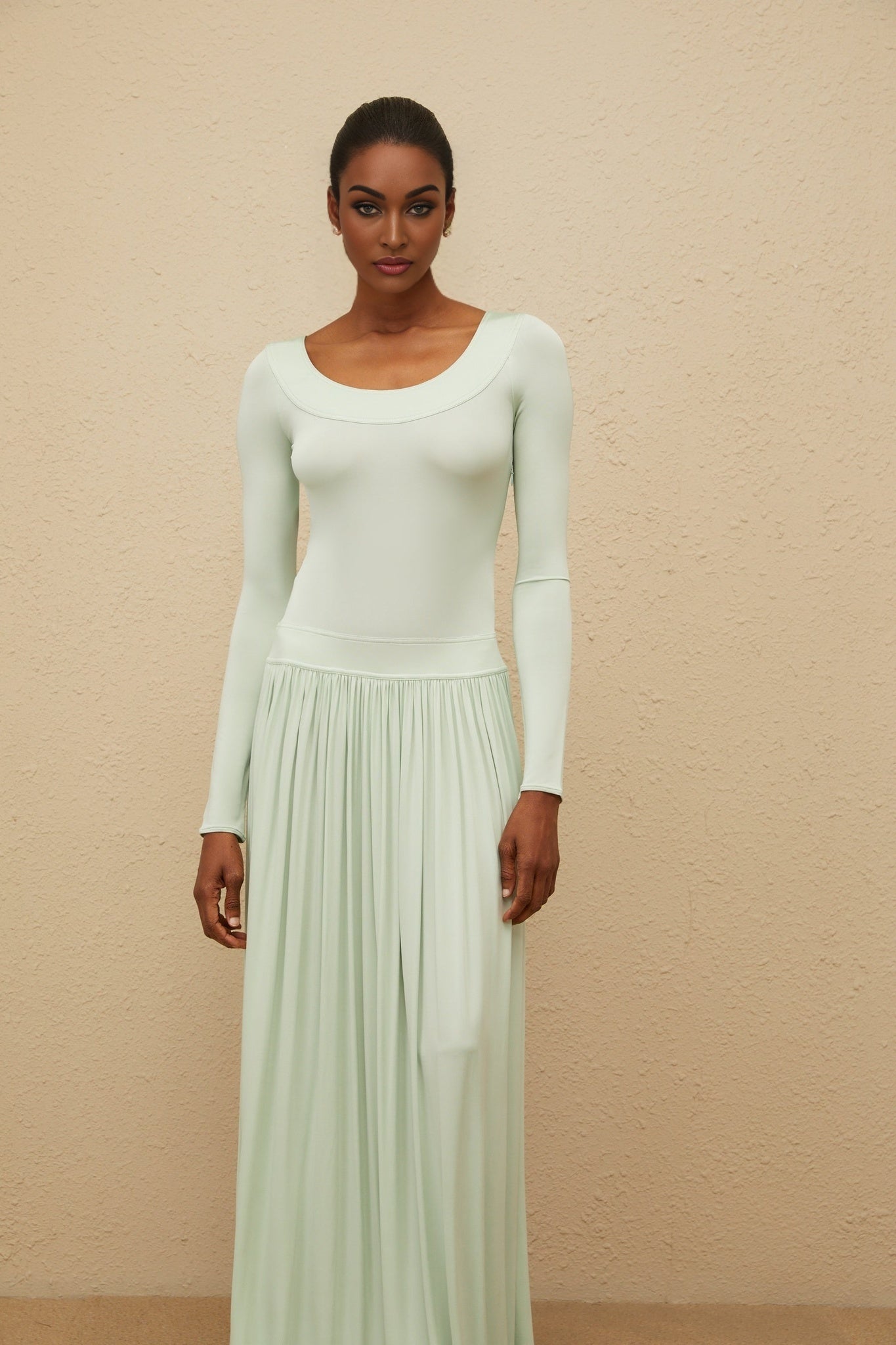 Green long sleeve maxi dress with open back and self-tie design