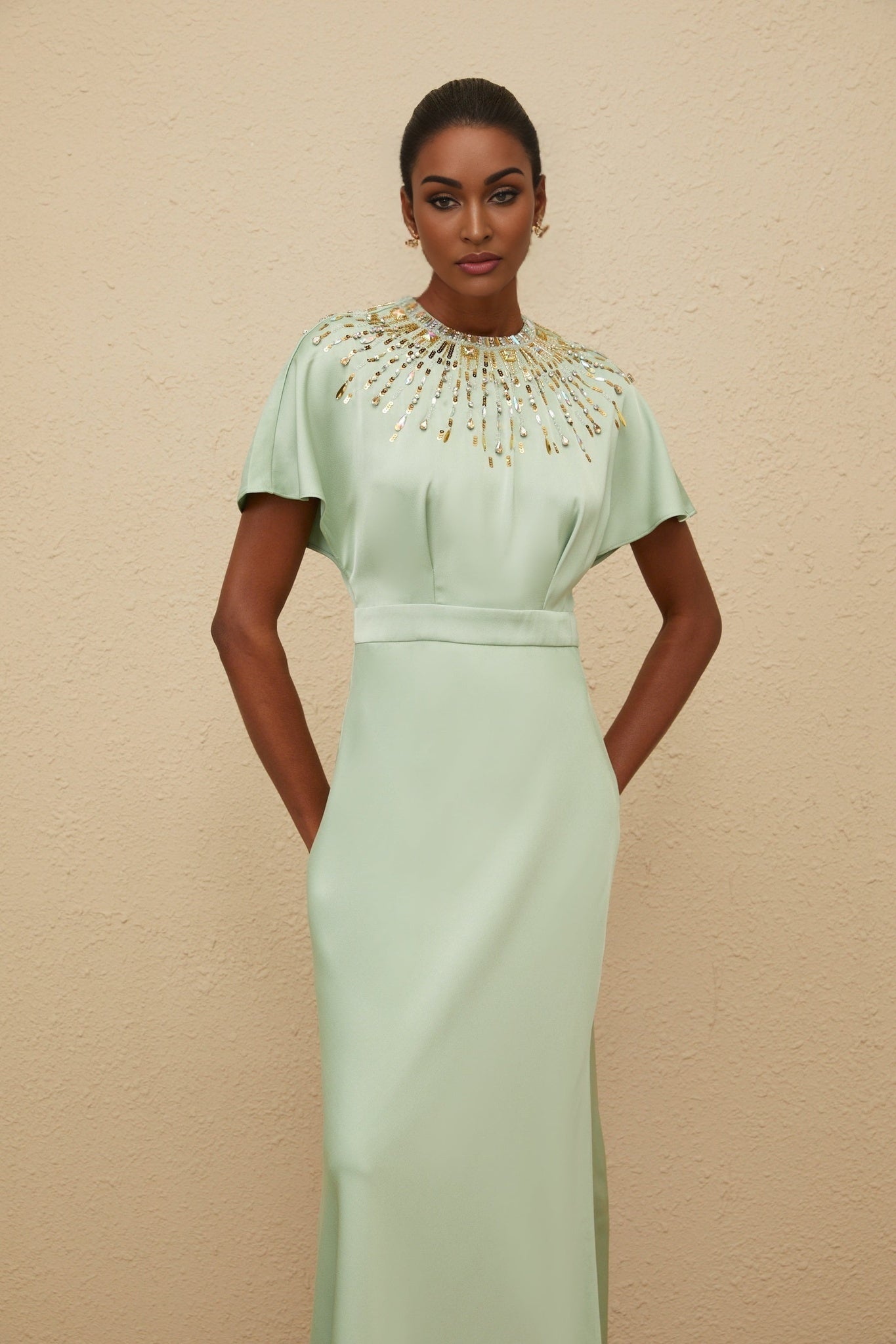 Green satin maxi dress with sequin, crystal, and bead embellishments