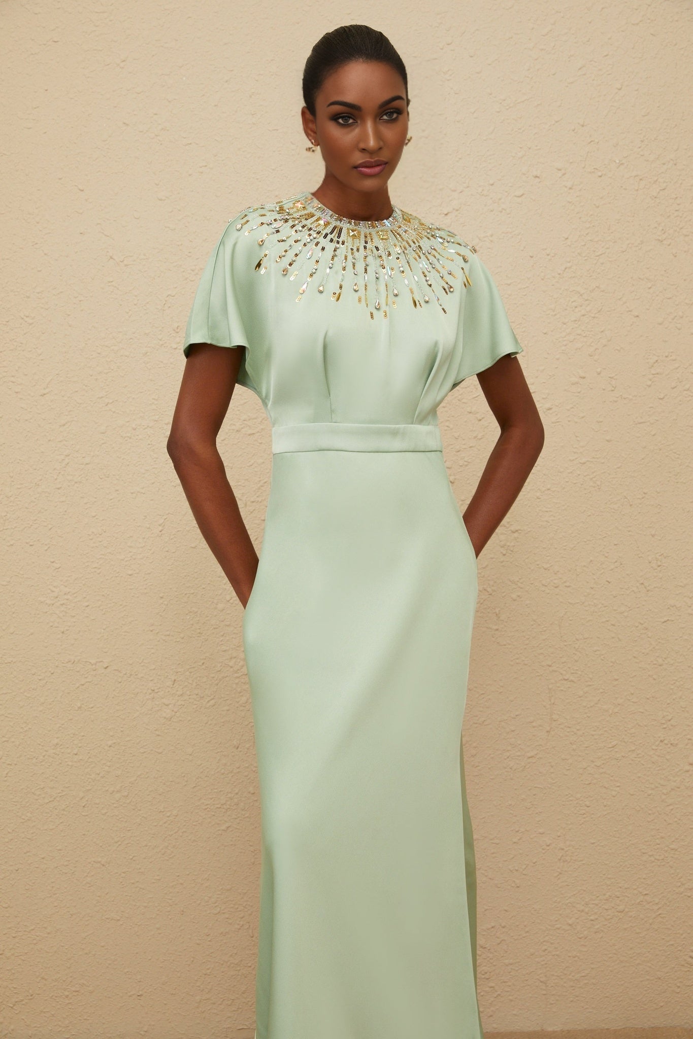 Green satin maxi dress with sequin, crystal, and bead embellishments