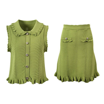 Green textured wave pattern sleeveless top with ruffled edges