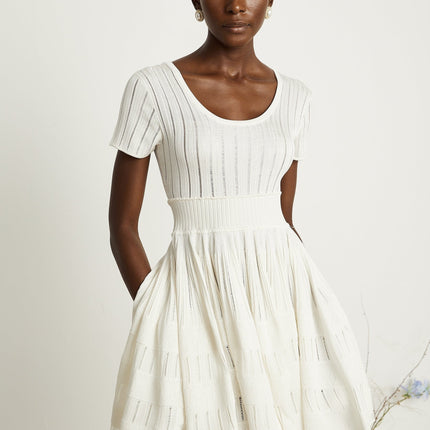 Greta White Knitted Mini Dress with Fitted Waistline and Pleated Design