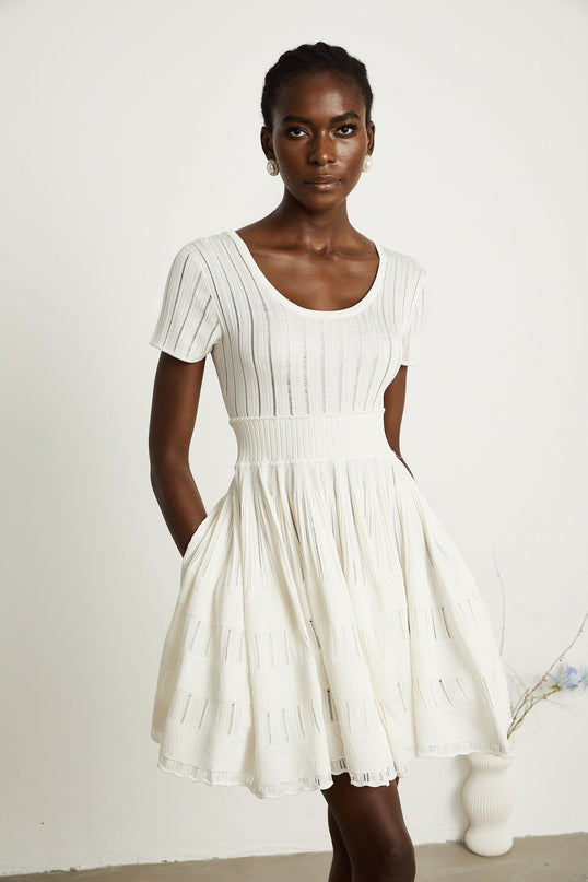 Greta White Knitted Mini Dress with Fitted Waistline and Pleated Design