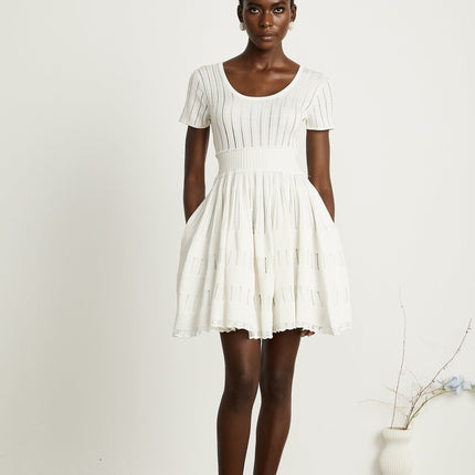 Greta White Knitted Mini Dress with Fitted Waistline and Pleated Design