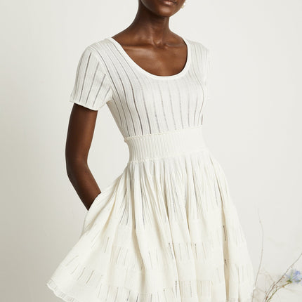 Greta White Knitted Mini Dress with Fitted Waistline and Pleated Design