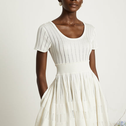 Greta White Knitted Mini Dress with Fitted Waistline and Pleated Design