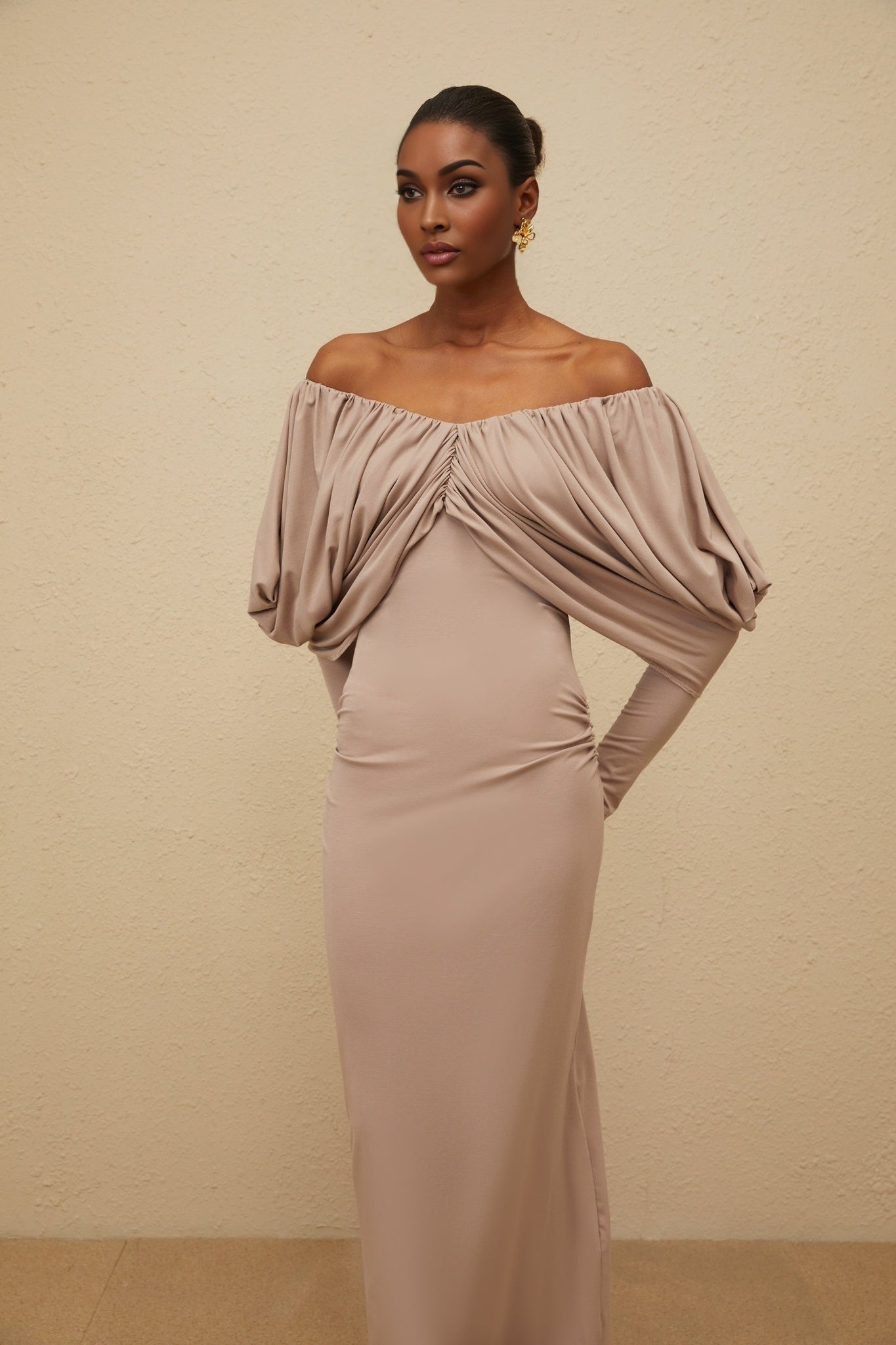 Grey V-neck long sleeve shift dress with ruched detailing and rear slit in calf length
