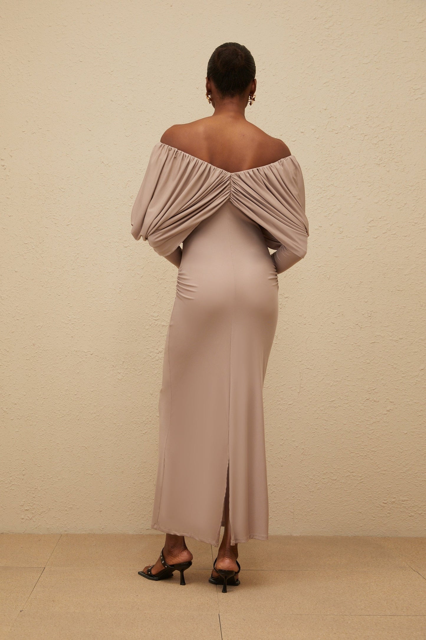 Grey V-neck long sleeve shift dress with ruched detailing and rear slit