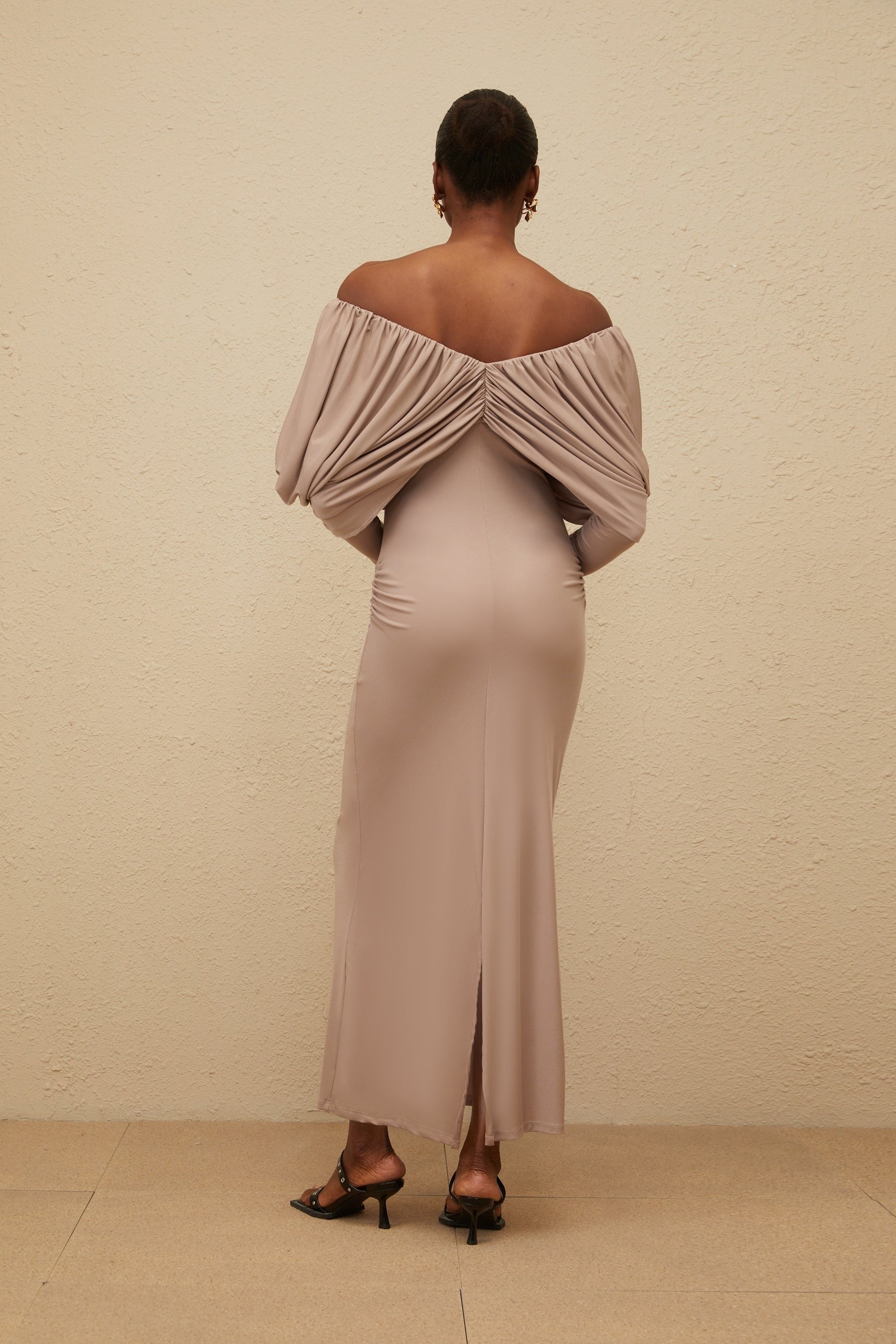 Grey V-neck long sleeve shift dress with ruched detailing and rear slit