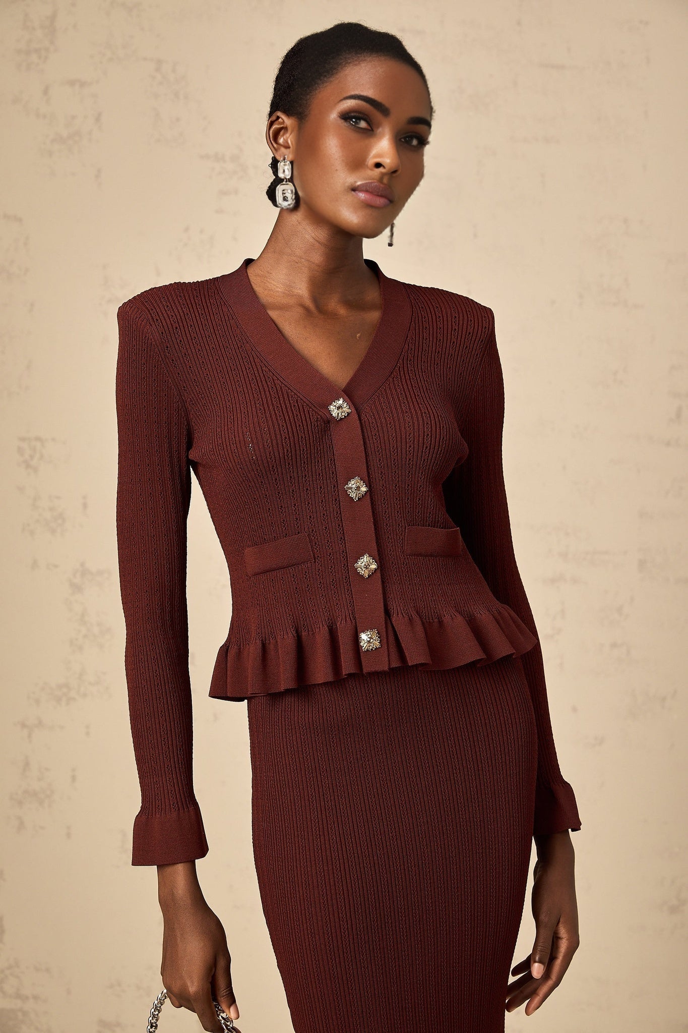 Heres a simple alt text for the product image based on the given title

Red knit matching set with ruffled top and skirt called Corrine