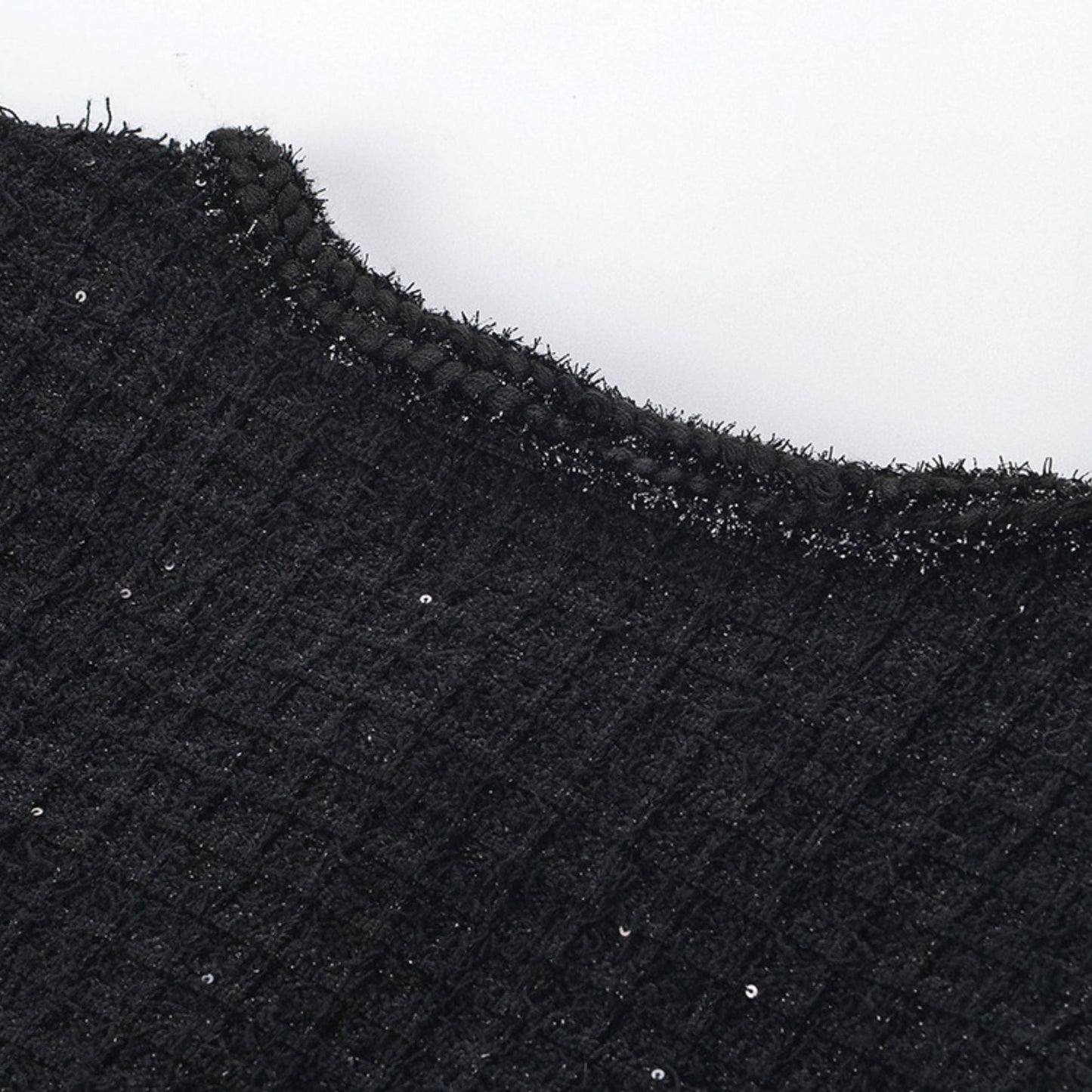 Black waffleknit dress with round neck long sleeves chest flap pockets and front button fastening Made of 80% Polyester and 20% Cotton